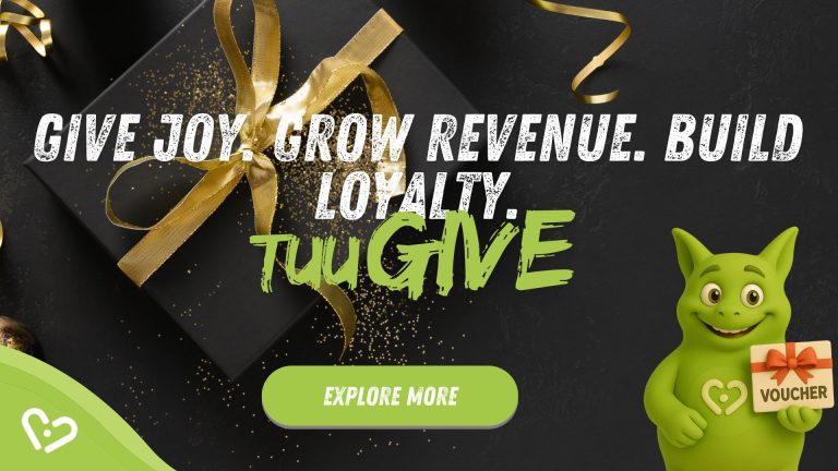 Black gift box with golden ribbon; Tuutuu smiling and holding a voucher. Text: 'Give Joy. Grow Revenue. TuuGIVE'.