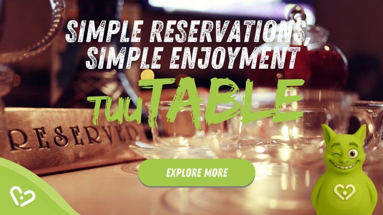 Reserved table with glassware in restaurant; Tuutuu winking. Text: 'Simple Reservations – TuuTABLE'.