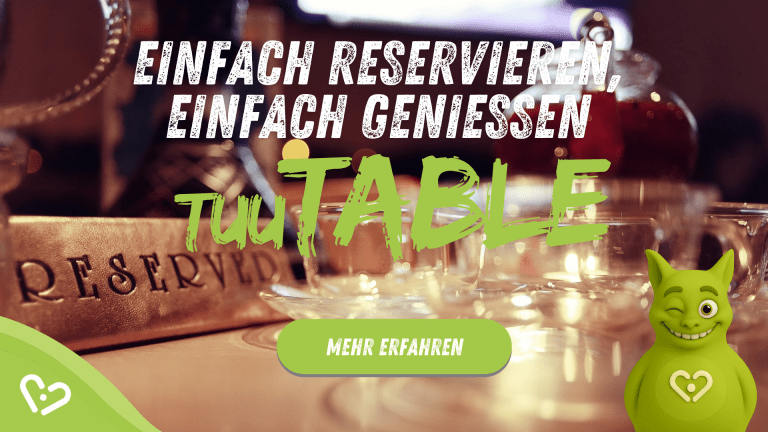 Ein Tisch mit einem „Reserviert“-Schild, im Bild steht die Überschrift: Einfach reservieren, einfach genießen – tuuTable, Und ein zwinkernder TuuTuu.