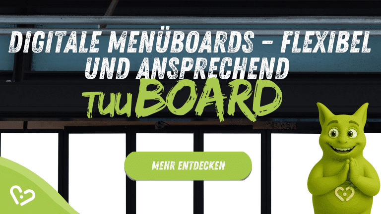 Tuutuu lächelt neben digitalen Menüboards. Bildtext: 'Digitale Menüboards – TuuBOARD'.
