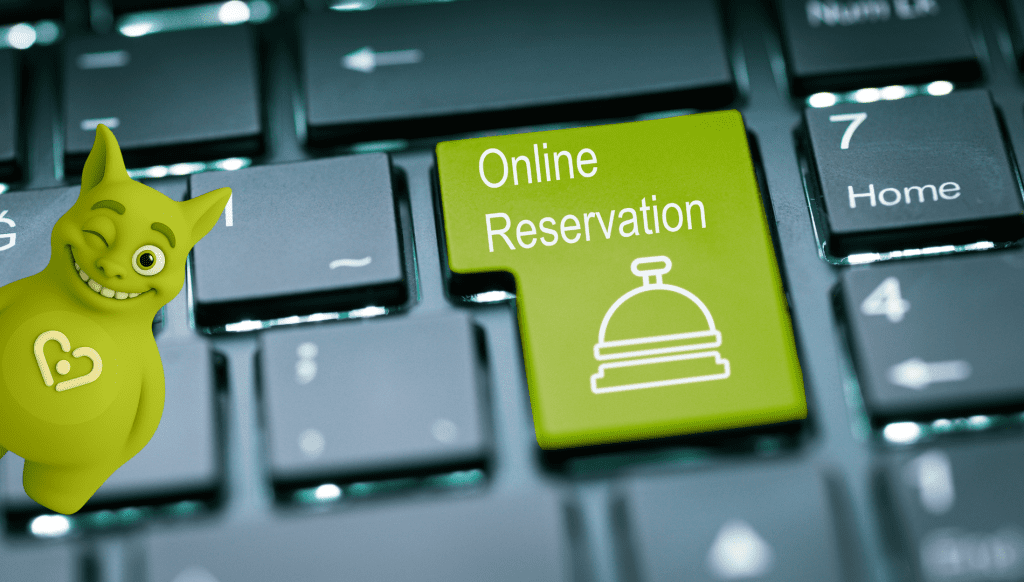 Green 'Online Reservation' key with bell icon on keyboard and winking Tuutuu mascot.